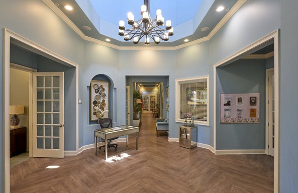Contemporary clubhouse with elegant decor at Arietta Apartments, offering a luxurious setting for residents to gather and unwind