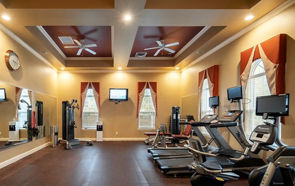 Modern fitness center with state-of-the-art equipment at Arietta Apartments for an active lifestyle