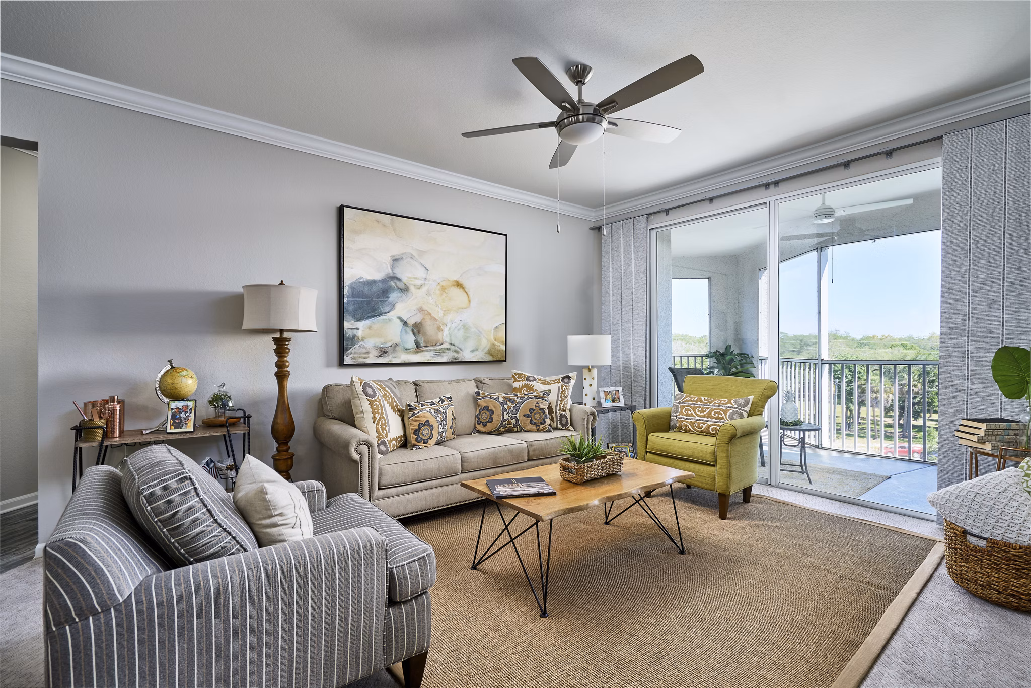 Spacious living room with contemporary furniture at Arietta Apartments, luxury Greystar property
