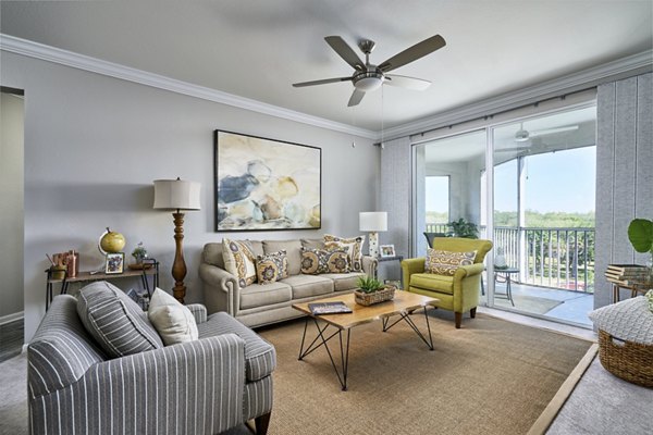 Spacious living room with contemporary furniture at Arietta Apartments, luxury Greystar property