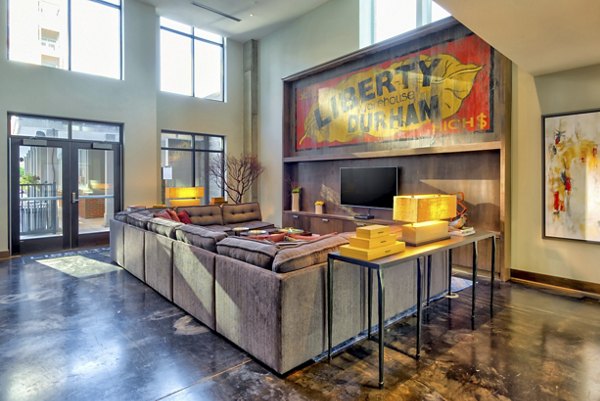Modern clubhouse featuring stylish furnishings at Liberty Warehouse Apartments