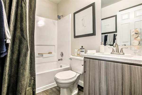 Modern bathroom with sleek fixtures at Avana Stoneridge Apartments