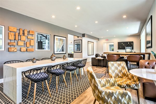 Clubhouse with elegant interior design and cozy seating at Avana Stoneridge Apartments