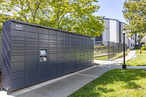 Modern mail room at Avana Stoneridge Apartments with secure package lockers and sleek design