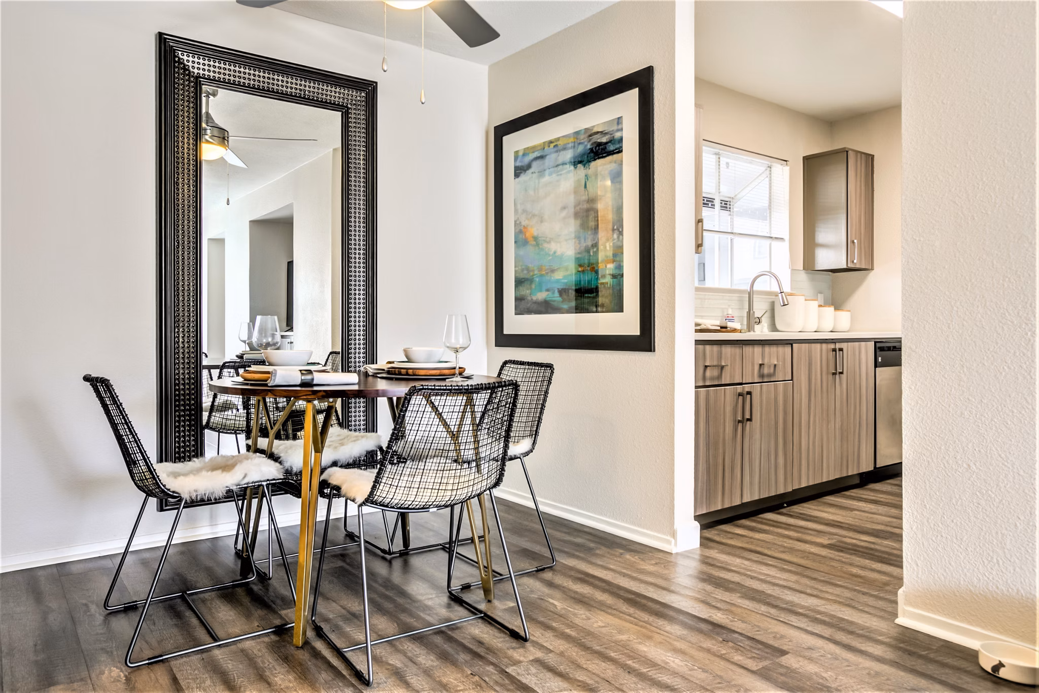 Dining area with modern decor and ample seating at Avana Stoneridge Apartments, part of Greystar's luxury apartment collection