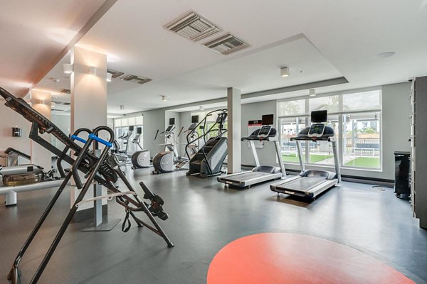 fitness center at South of Atlantic (SofA) Apartments