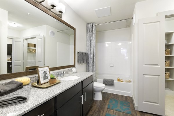 Bathroom featuring modern fixtures at Villas on the Hill Apartments