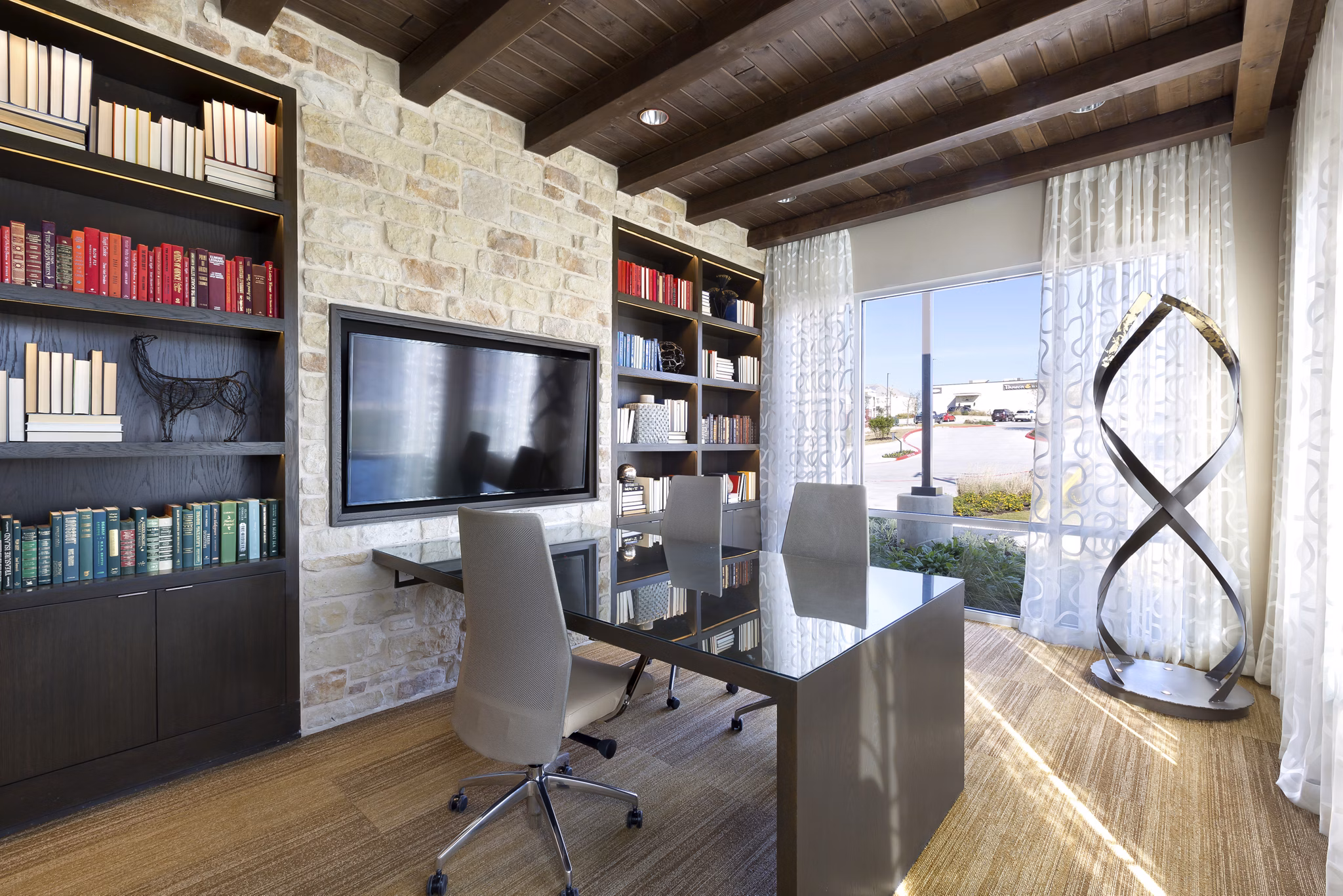 Clubhouse featuring modern design and comfortable seating at Villas on the Hill Apartments