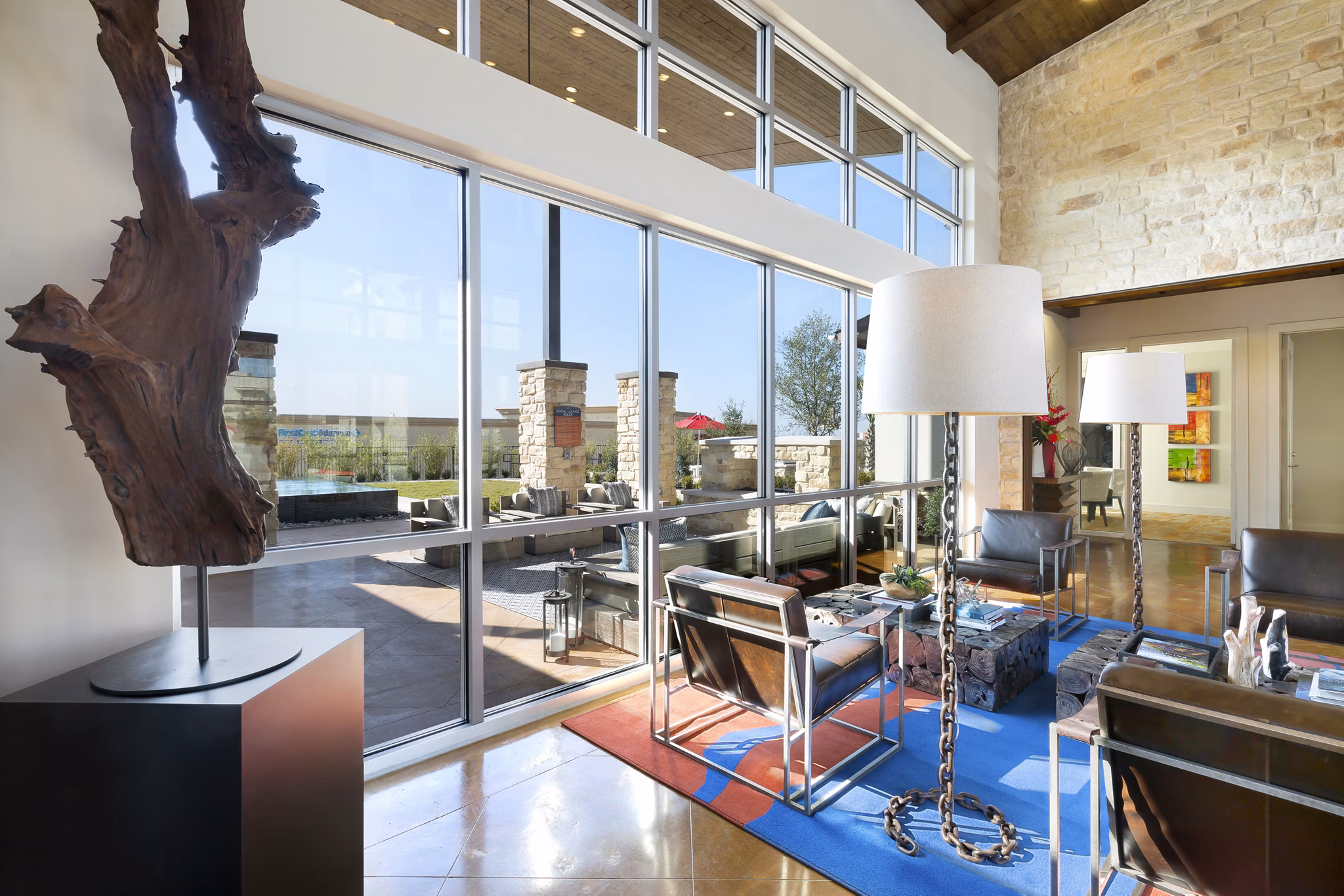 Clubhouse featuring modern lounge and entertainment area at Villas on the Hill Apartments