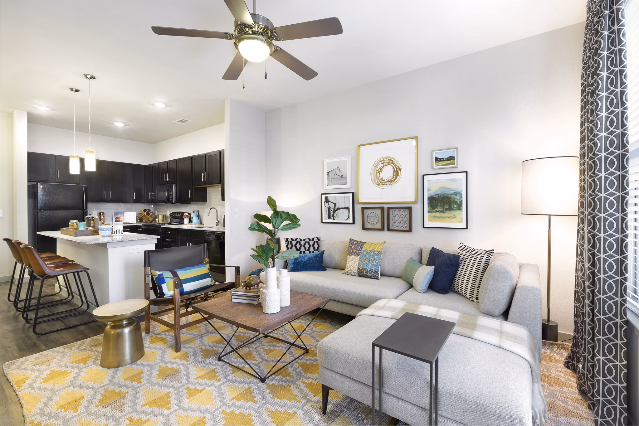 Spacious living room with modern decor at Villas on the Hill Apartments