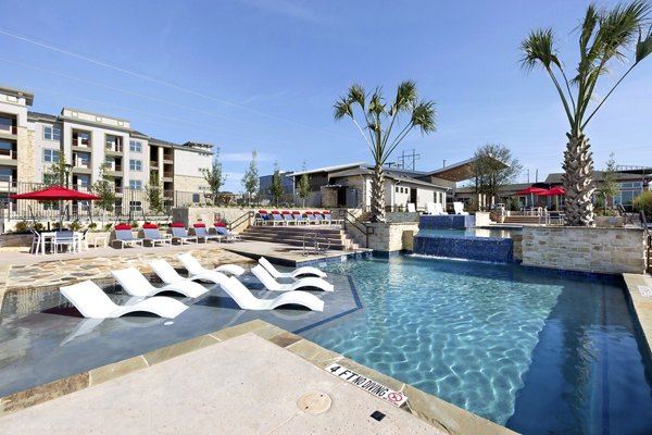 Resort-style pool at Villas on the Hill Apartments offering relaxation and leisure activities