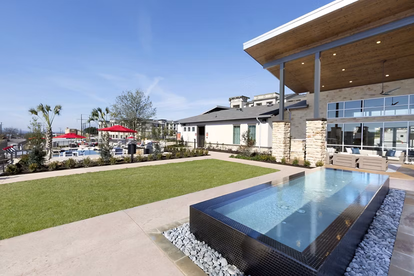 Cozy patio with modern furnishings at Villas on the Hill Apartments offering a serene outdoor space for relaxation