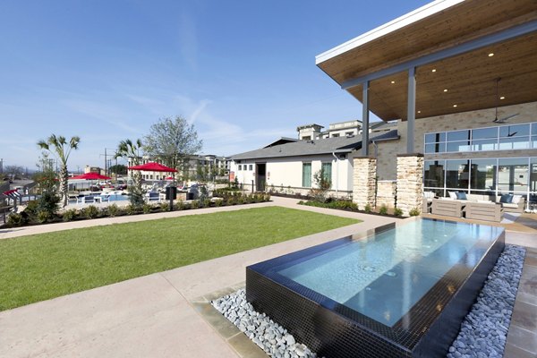 Cozy patio with modern furnishings at Villas on the Hill Apartments offering a serene outdoor space for relaxation