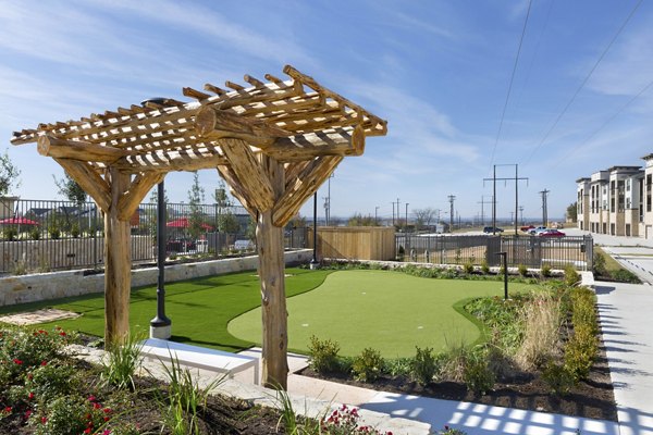 Elegant patio featuring stylish outdoor furniture at Villas on the Hill Apartments