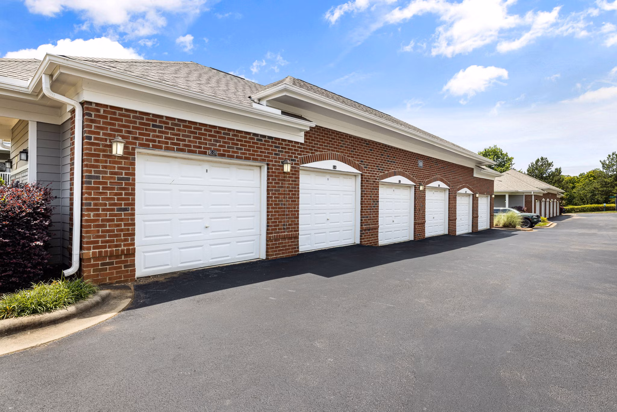 Secure parking garage at Windsor at Tryon Village Apartments with easy access and ample spaces for residents' convenience