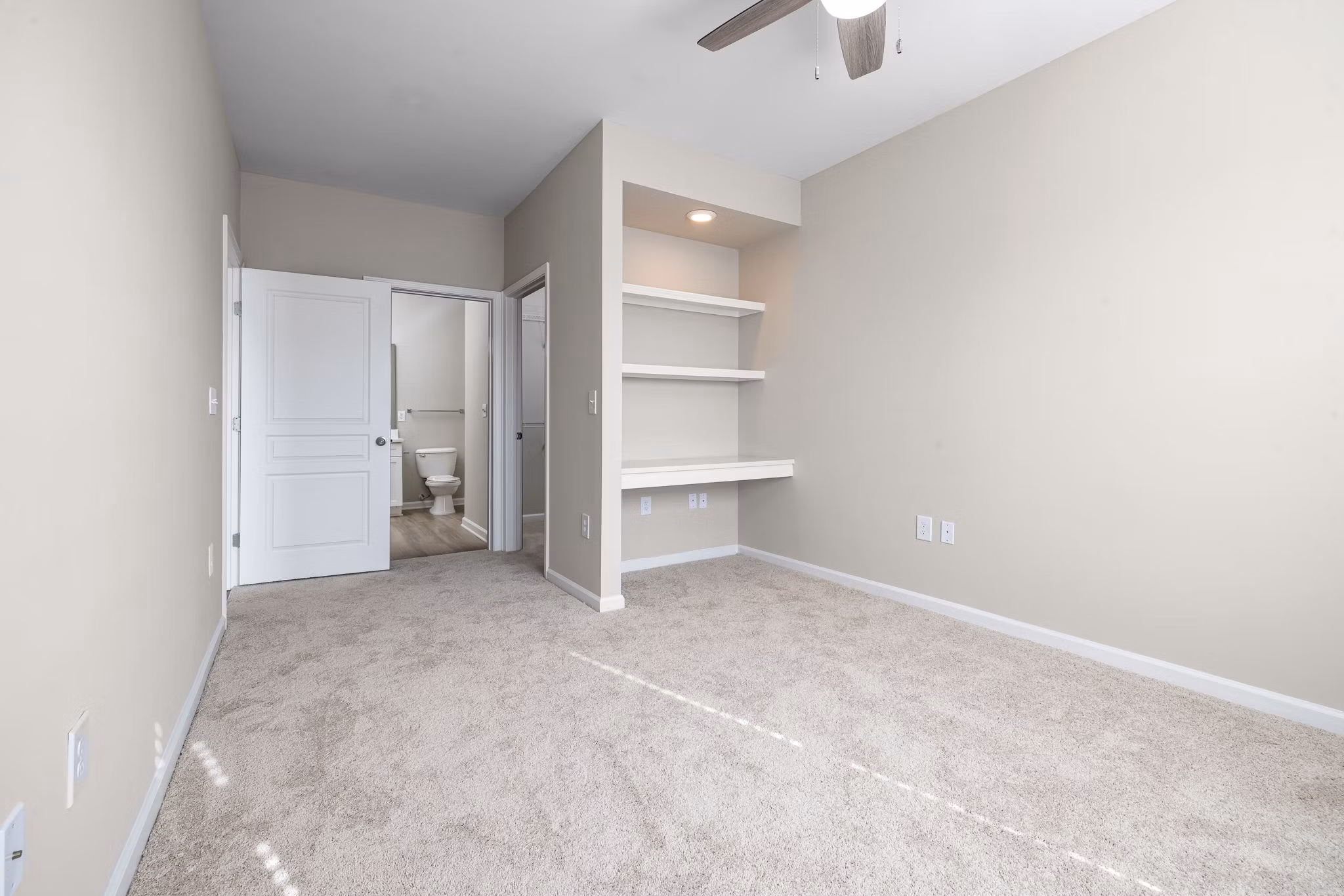 Cozy bedroom with elegant decor in Windsor at Tryon Village Apartments