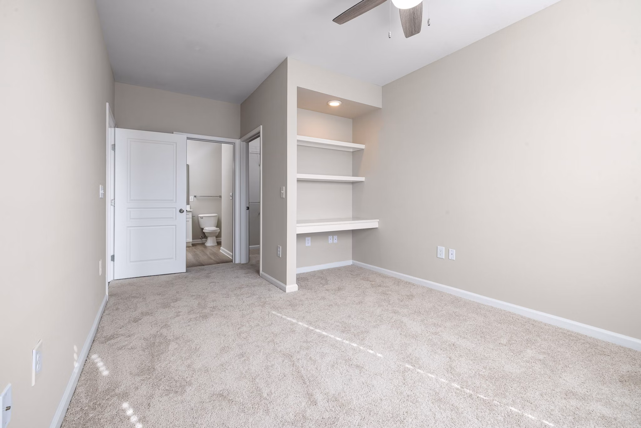 Cozy bedroom with elegant decor in Windsor at Tryon Village Apartments