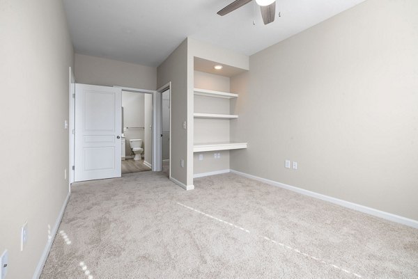 Cozy bedroom with elegant decor in Windsor at Tryon Village Apartments