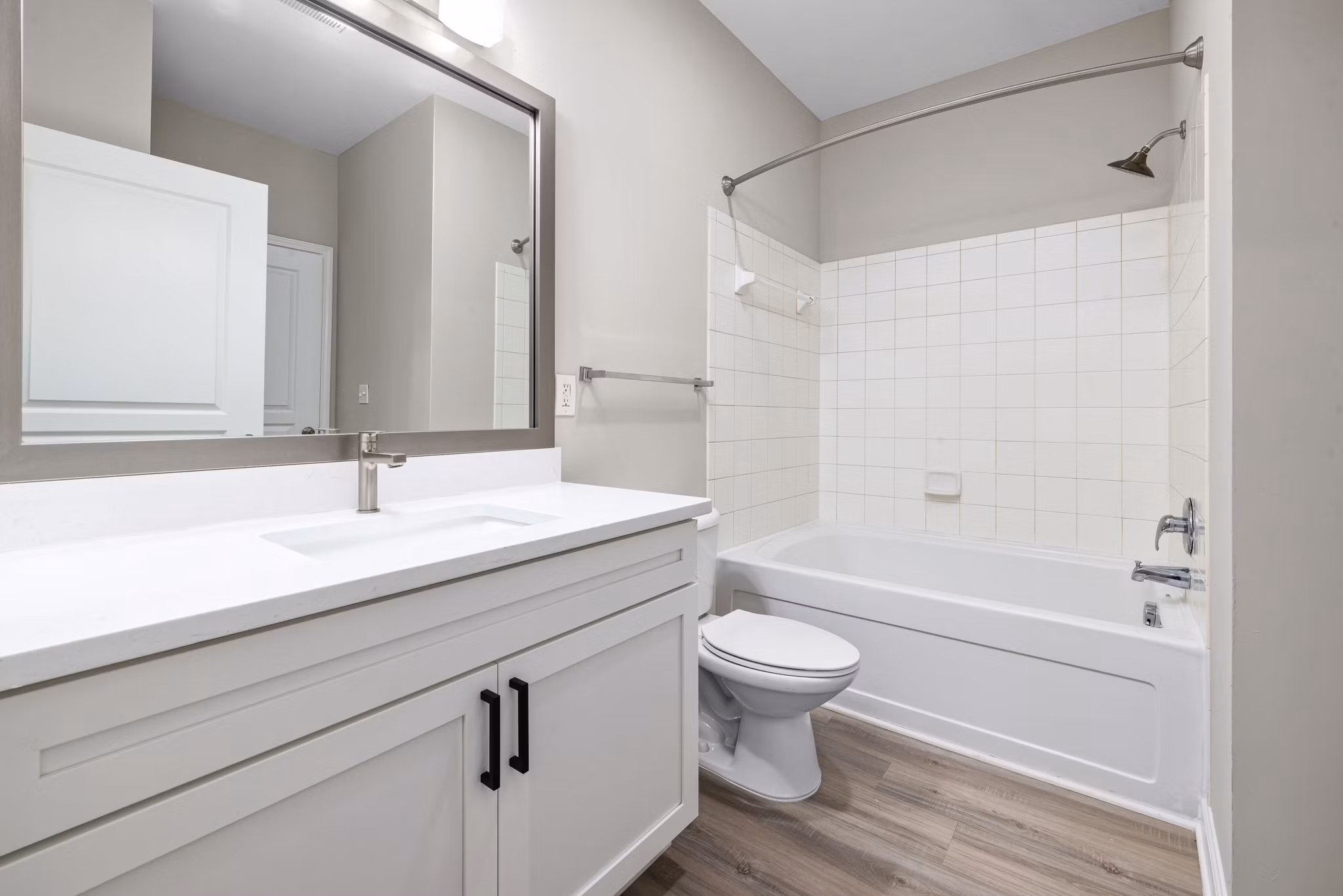 Luxury bathroom with elegant fixtures and granite countertops at Windsor at Tryon Village Apartments