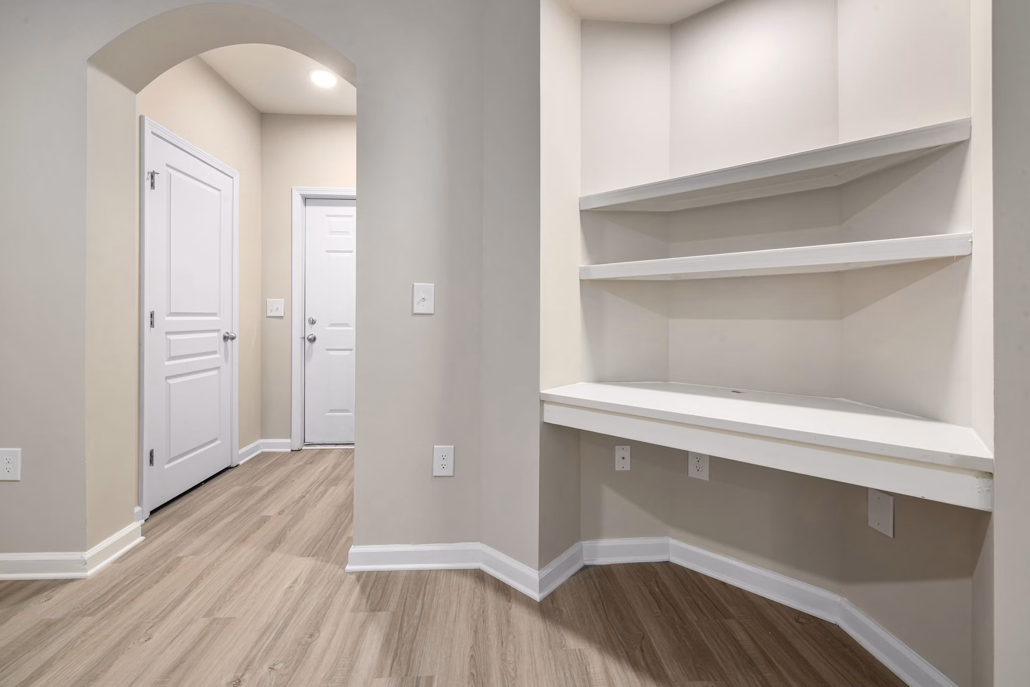 Elegant kitchen with stainless steel appliances and granite countertops in Windsor at Tryon Village Apartments