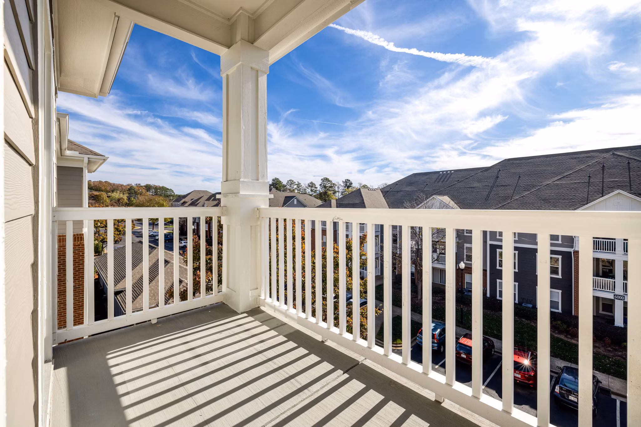Patio with comfortable seating at Windsor at Tryon Village Apartments, perfect for relaxation and luxury living