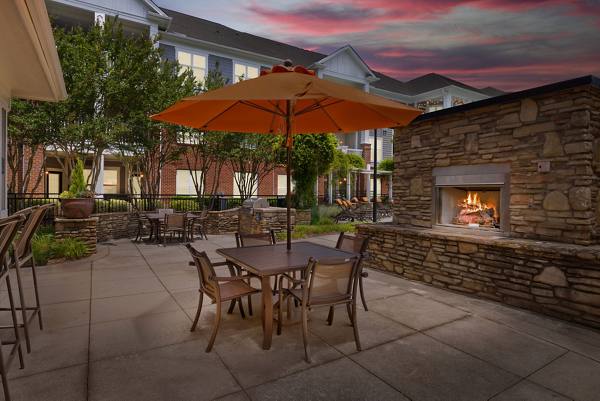 fire pit/fireplace at Windsor at Tryon Village Apartments