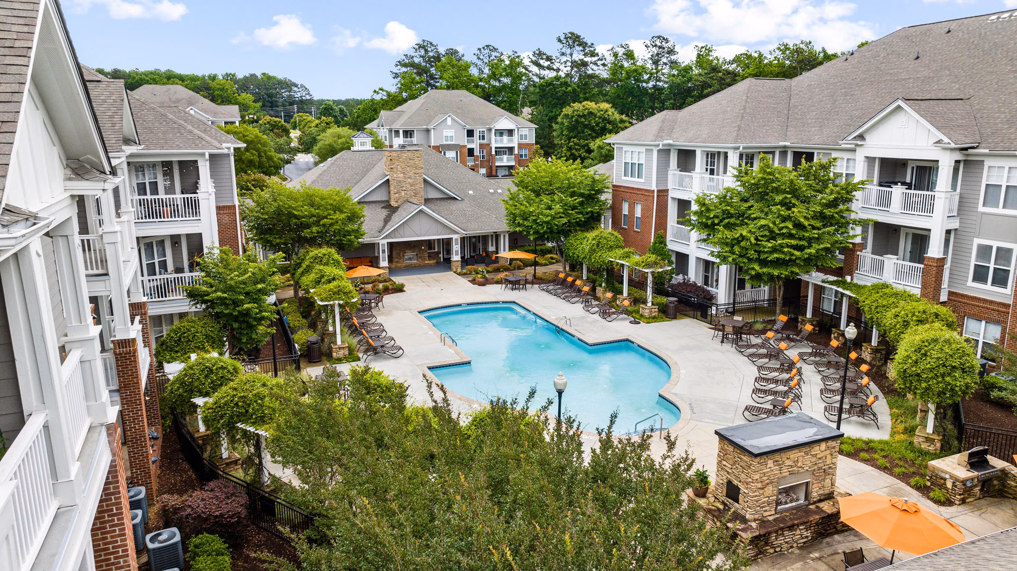 Windsor at Tryon Village: Scenic view of luxury apartments with lush landscaping in Cary, NC