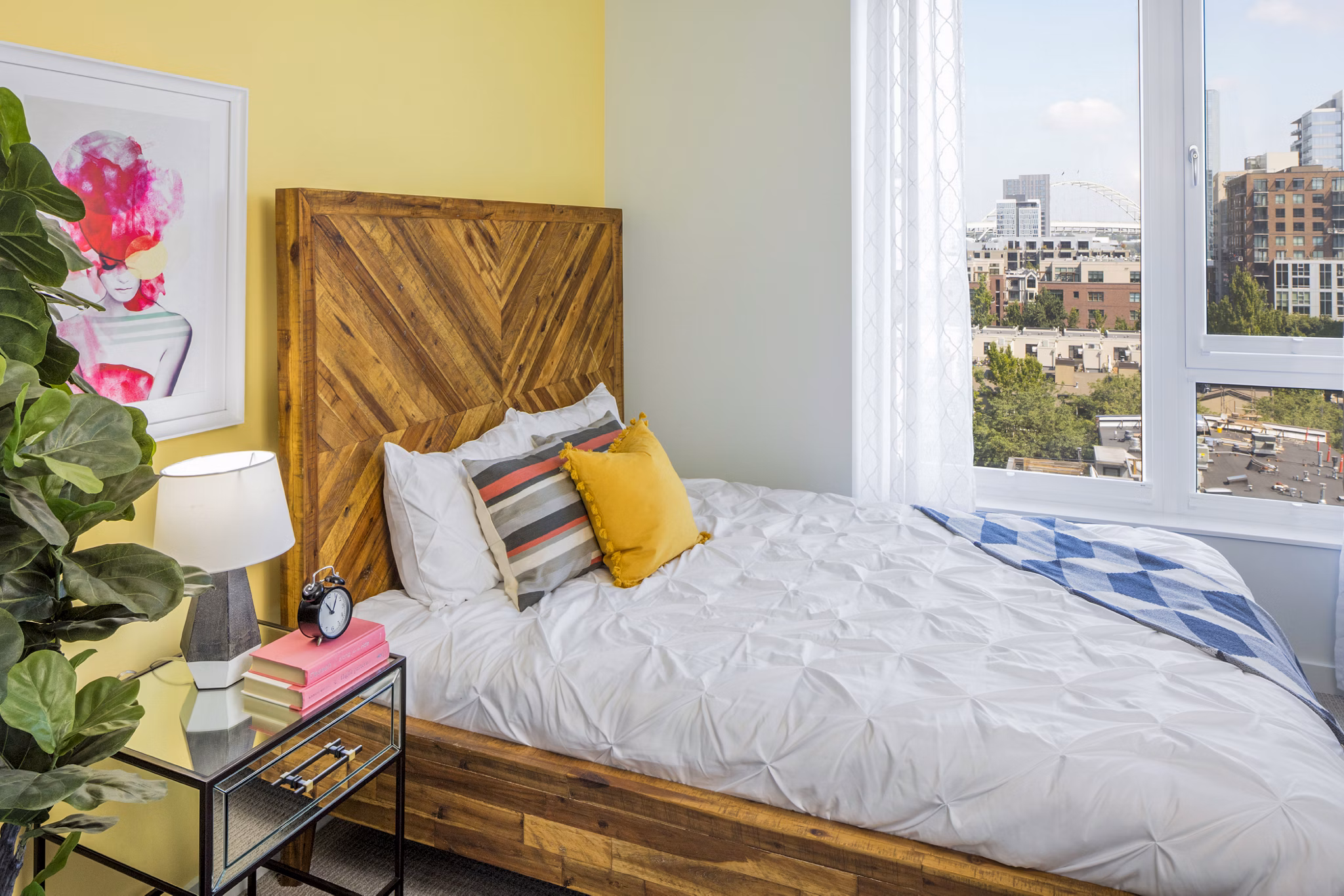 Elegant bedroom with modern furnishings at Dianne Apartments, offering luxury comfort in a premium location