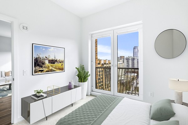 Spacious bedroom with modern decor at Dianne Apartments: Luxury living by Greystar