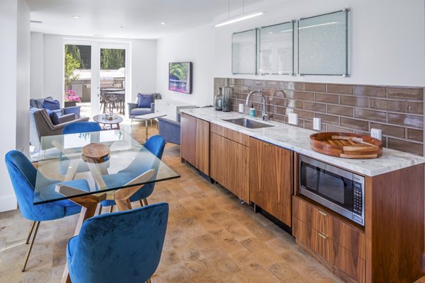 Luxe clubhouse with modern decor at Dianne Apartments, perfect for gatherings and relaxation