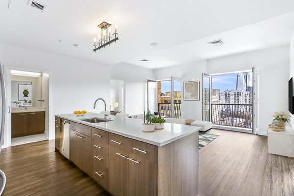 Modern kitchen with stainless steel appliances at Dianne Apartments, Greystar luxury apartments