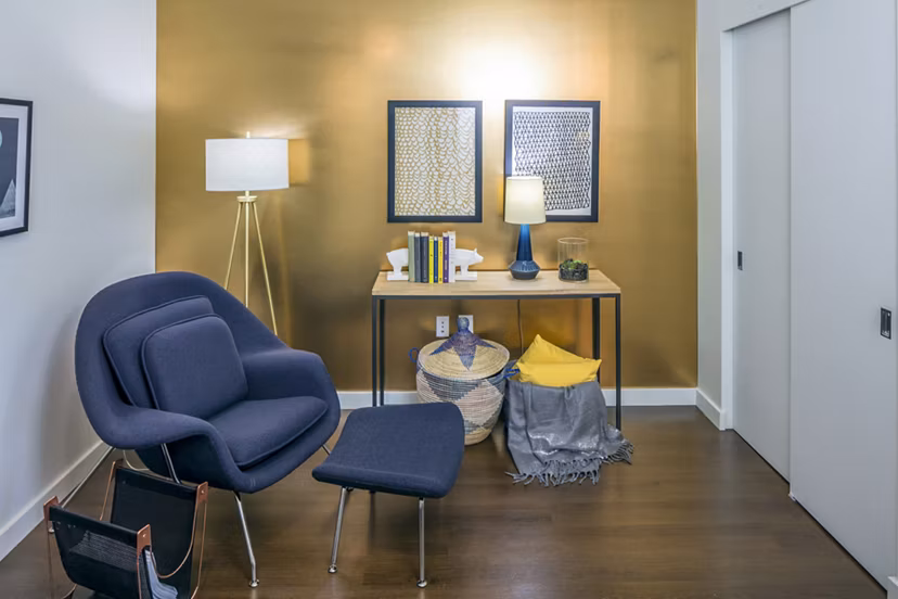 Home office with modern desk setup at Dianne Apartments