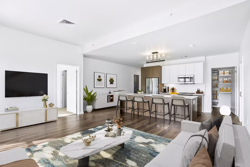 Modern living room with large windows and chic decor at Dianne Apartments, luxurious city living