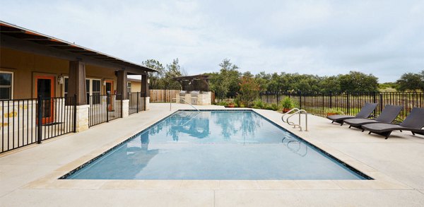 Outdoor community pool at Vickery Grove Rental Homes offering leisure and relaxation in a well-maintained setting