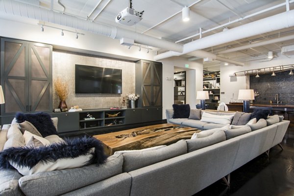 Clubhouse featuring modern design elements at Ellison on Broad Apartments, perfect for relaxing and socializing in style