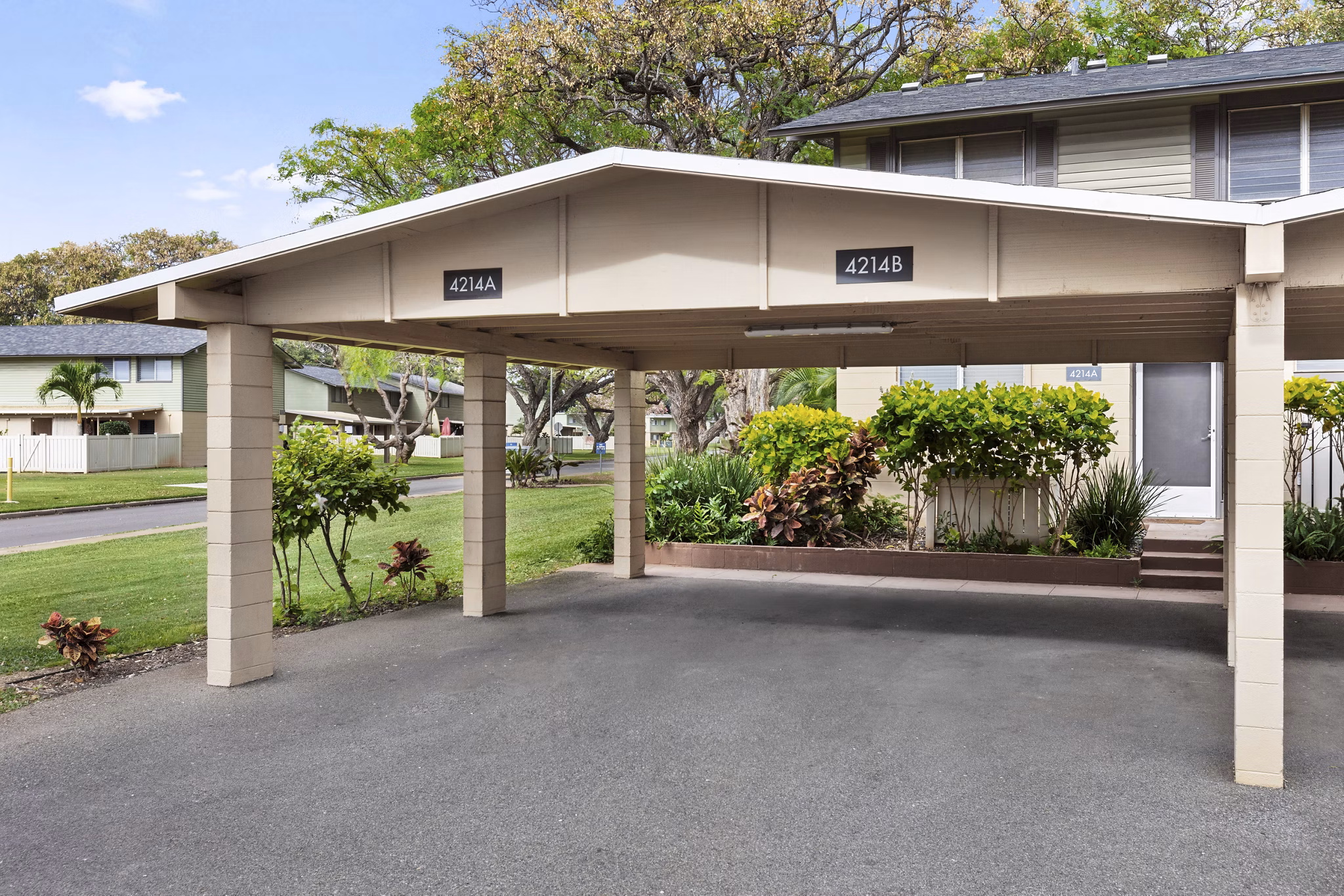 Covered parking at Kalaeloa Rental Homes featuring convenient resident parking spaces