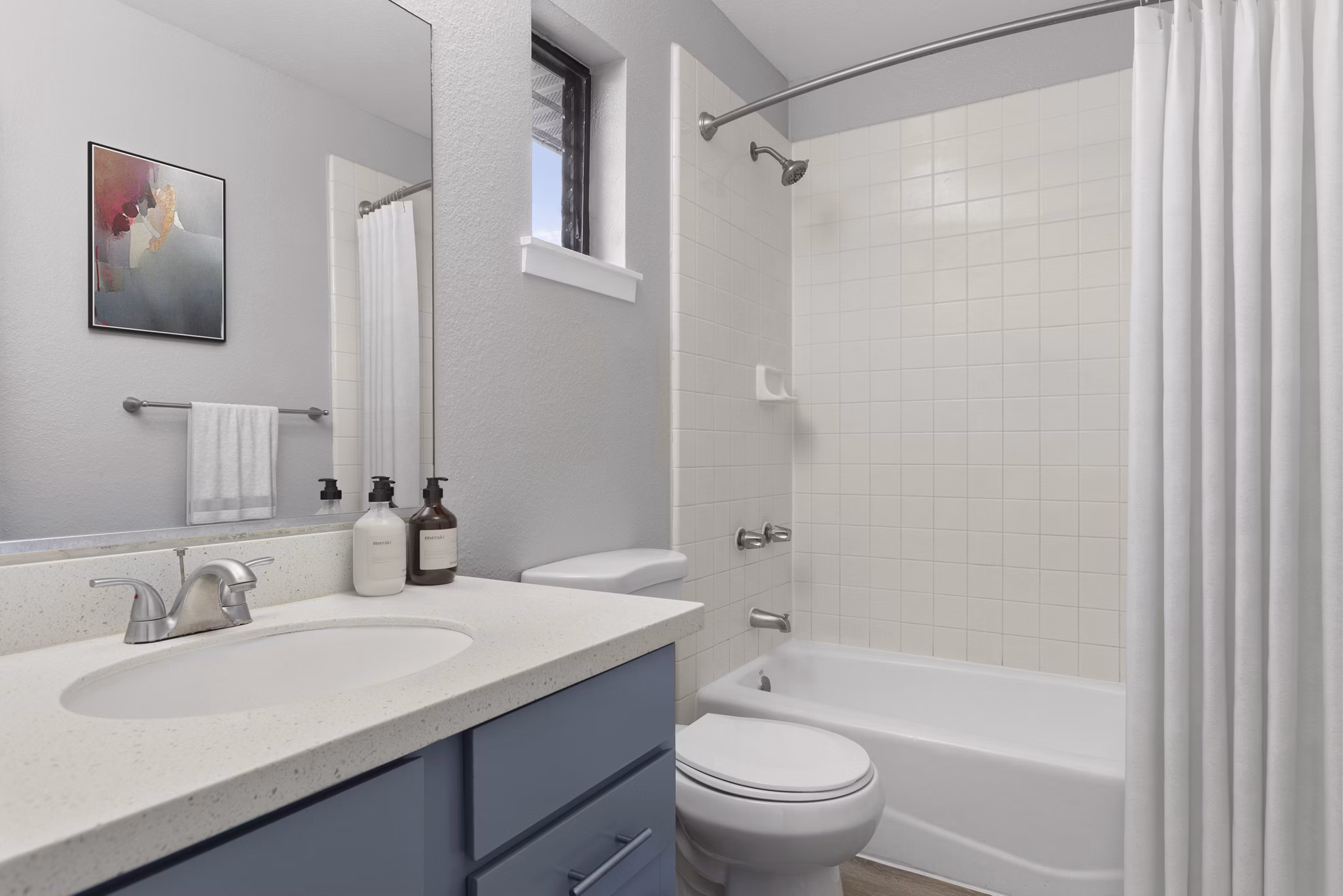 Kalaeloa Rental Homes: Modern bathroom with sleek fixtures and double vanity in luxury apartments