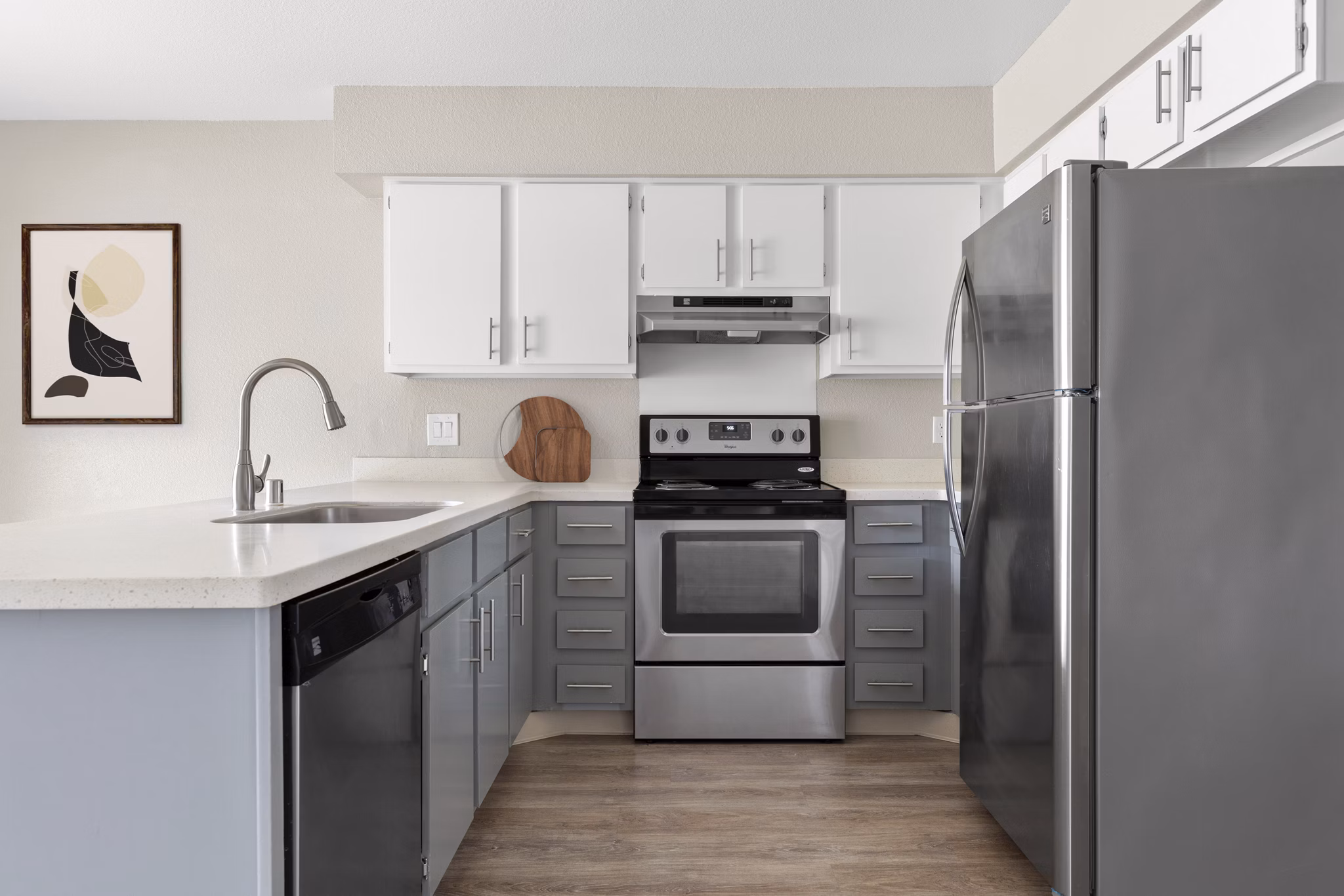 Modern kitchen with stainless steel appliances in Kalaeloa Rental Homes