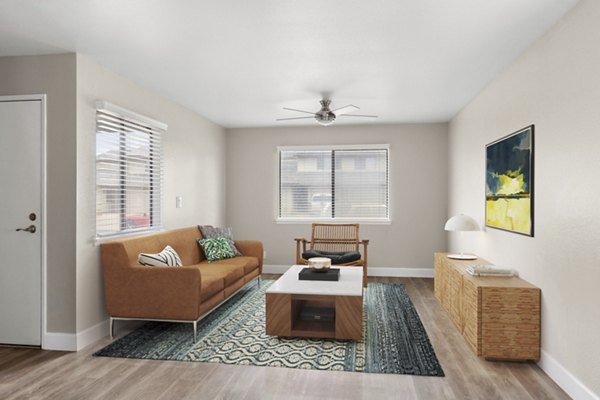 Cozy living room with plush seating and natural light in Kalaeloa Rental Homes