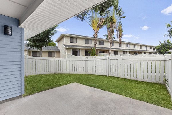 Patio space with cozy seating at Kalaeloa Rental Homes, perfect for outdoor relaxation and entertainment