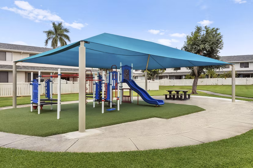 Children's playground with modern equipment at Kalaeloa Rental Homes
