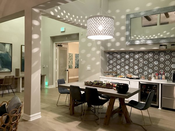 Cape May at Harveston: Elegant clubhouse with modern design and comfortable seating options available for residents