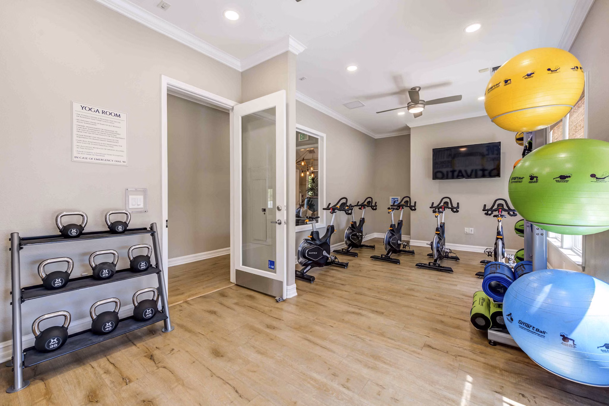 fitness center at Cape May at Harveston Apartments