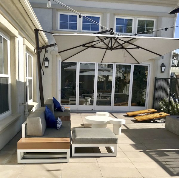 Cape May at Harveston: Scenic patio with outdoor seating at luxury apartments in Temecula