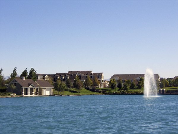 Cape May at Harveston: Serene pond view at luxury apartments in a tranquil setting