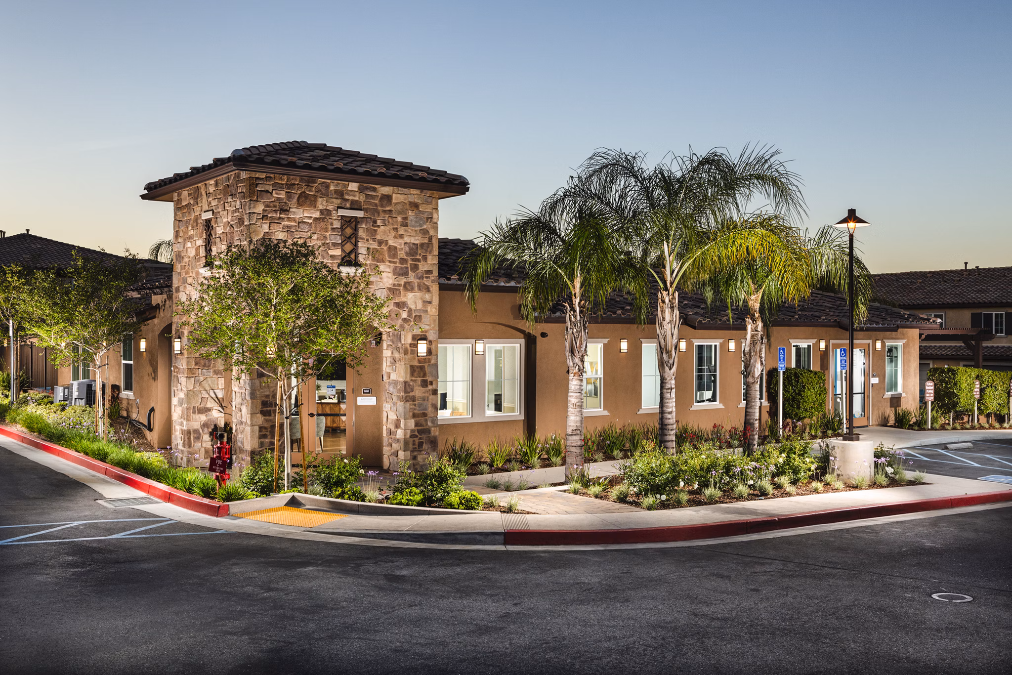 Bedroom featuring elegant decor and ample natural light at Townhomes at Lost Canyon Apartments