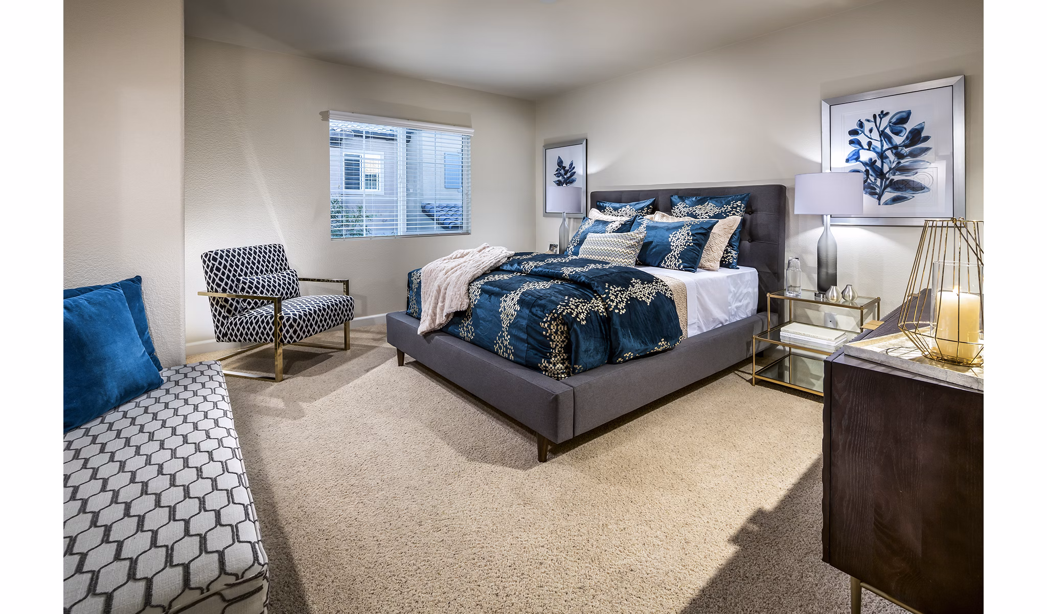 Bedroom with modern furnishings and natural light at Townhomes at Lost Canyon Apartments