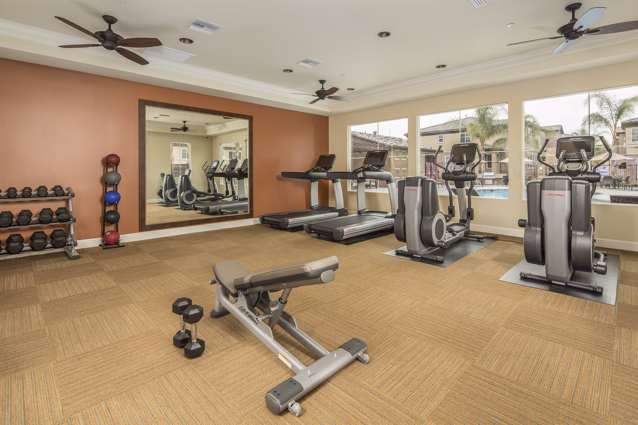 Modern kitchen with stainless steel appliances at Townhomes at Lost Canyon Apartments