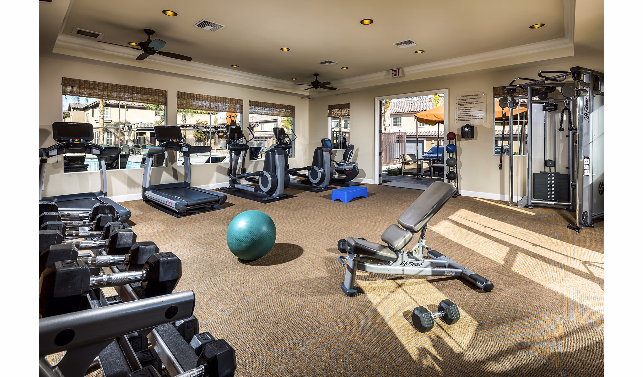 State-of-the-art fitness center at Townhomes at Lost Canyon Apartments with modern equipment and spacious workout areas