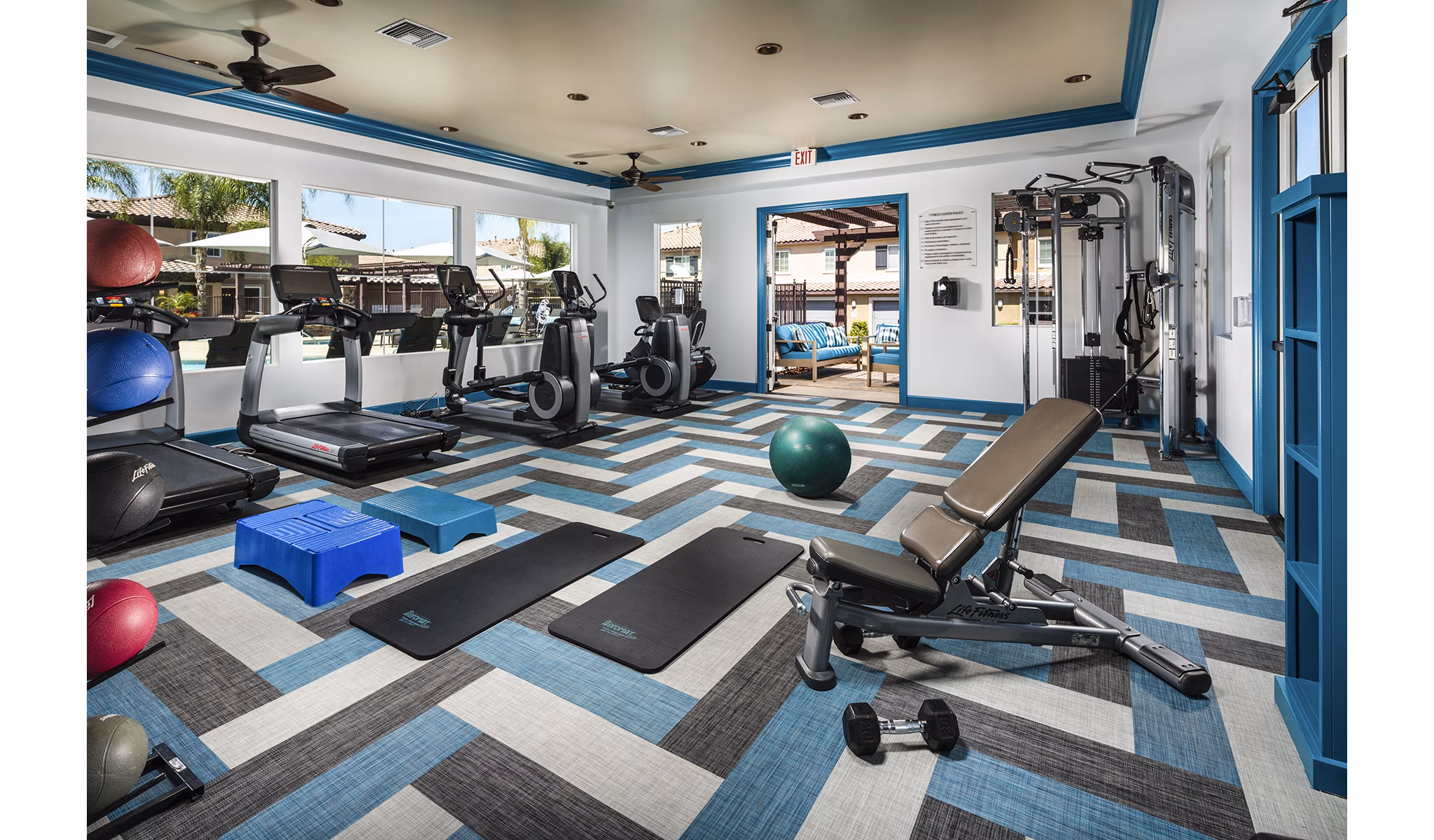 State-of-the-art fitness center at Townhomes at Lost Canyon Apartments featuring modern equipment and spacious workout areas